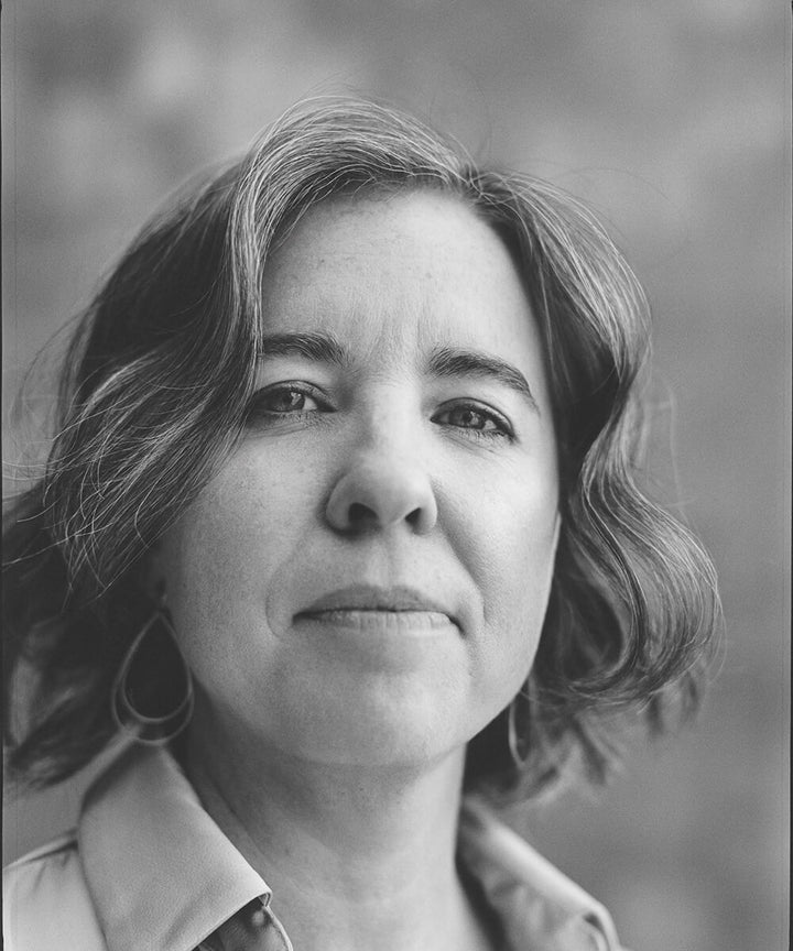 Black and white portrait of a woman with a blurred background