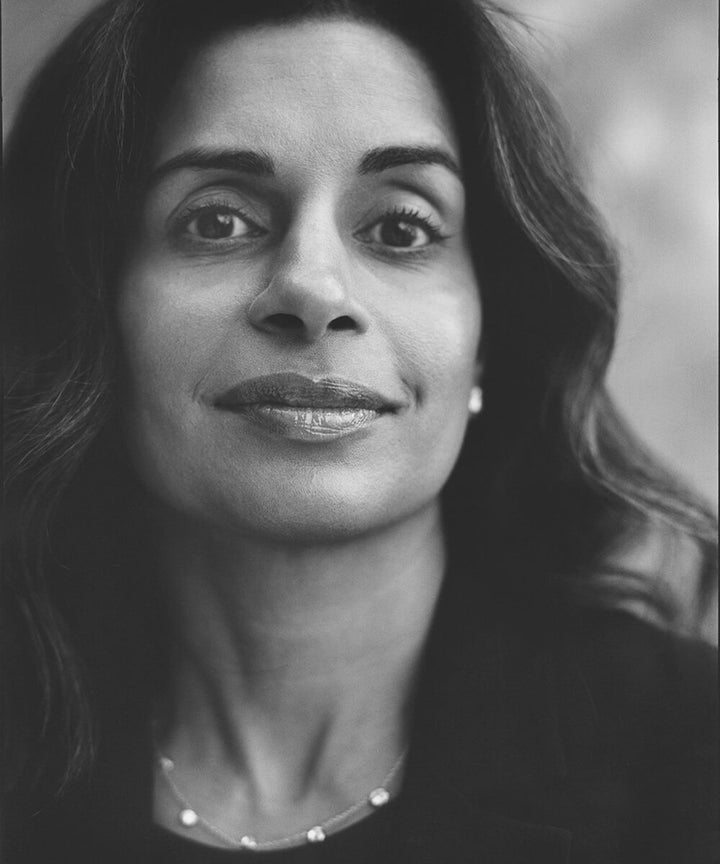 Black and white portrait of a woman with a blurred background