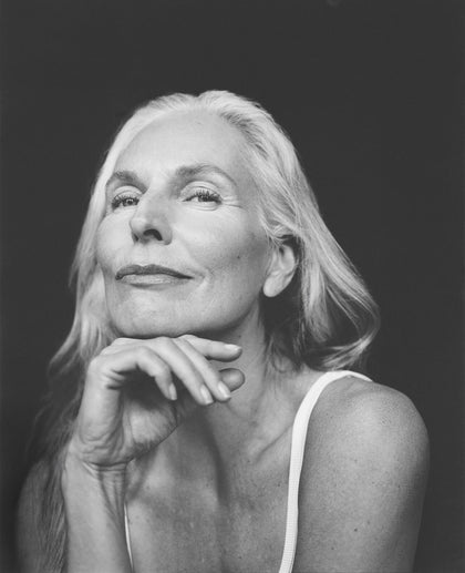 Woman wearing a clean white dress, embodying wellness and calm for Biologica’s holistic lifestyle brand.